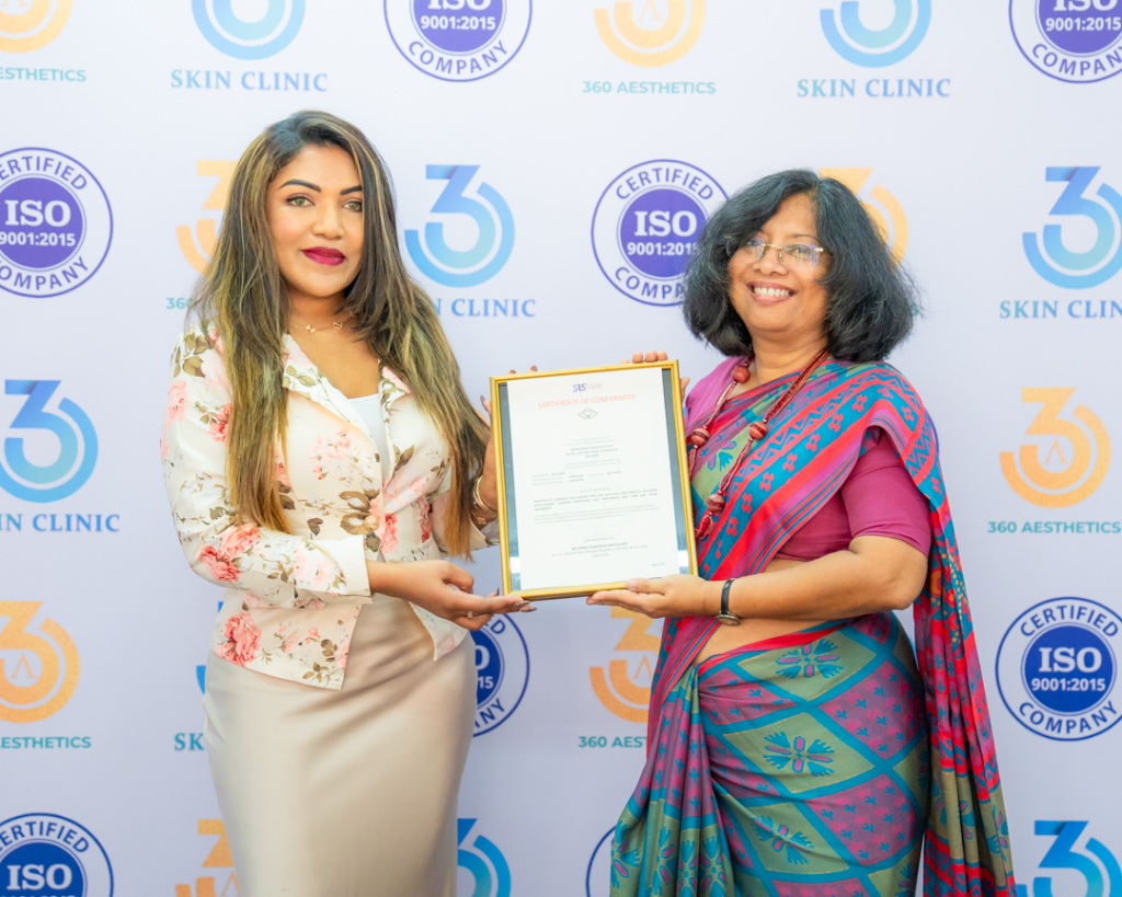 1. dr. sarah fazy receiving the iso 90012015 certification